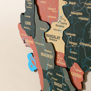 Close-up of the Sage Myanmar wooden wall map with layered regions and printed names