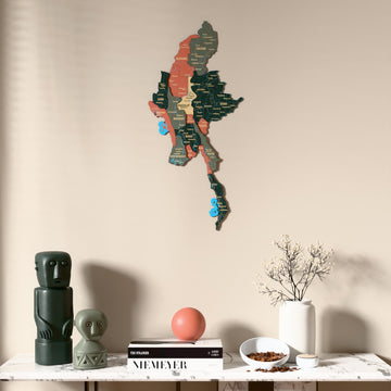 Sage Myanmar wooden wall map above a marble console, front view