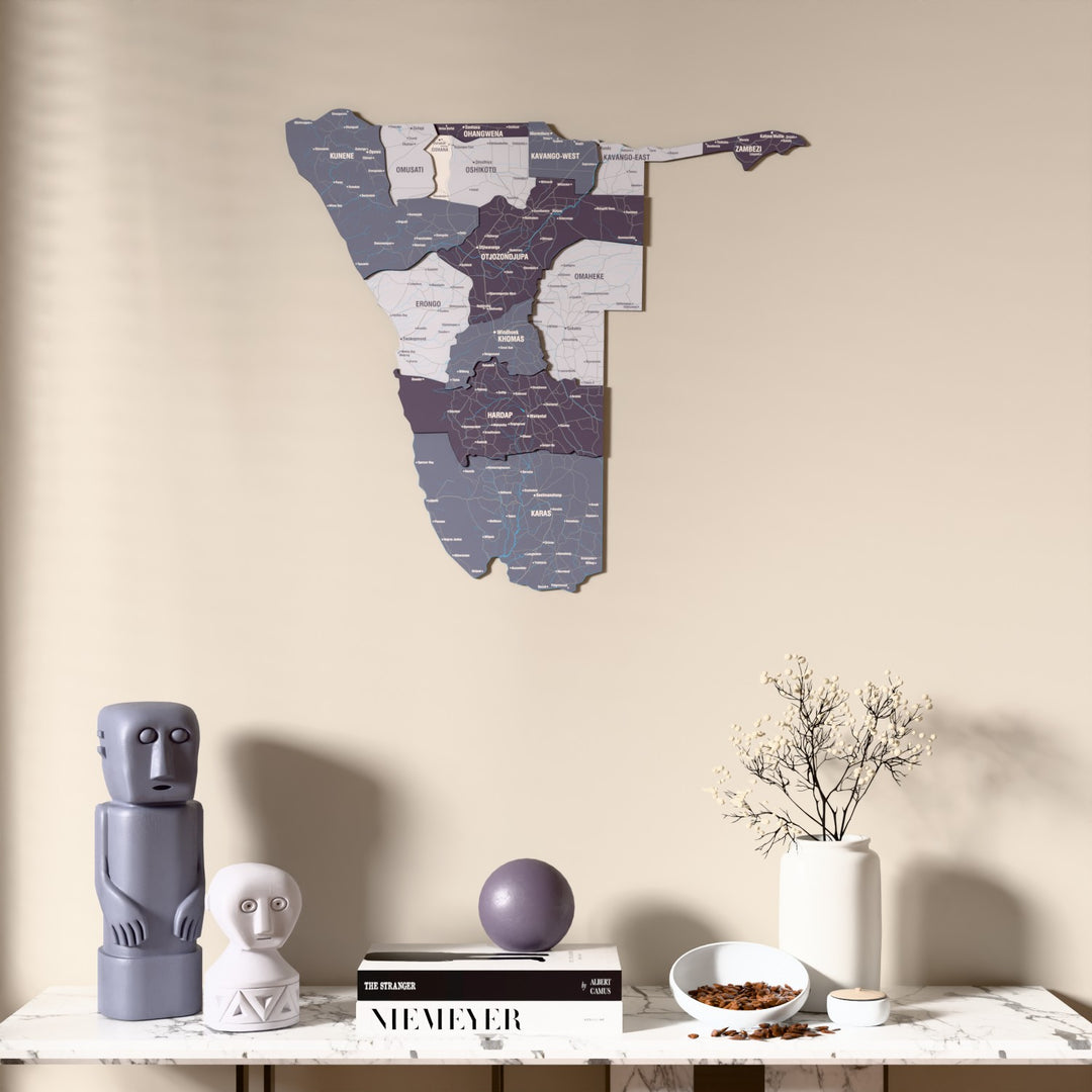 Nimbus Namibia wooden wall map above a marble console, front view