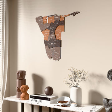 Soil Namibia wooden wall map beside a sheer curtain, angled view