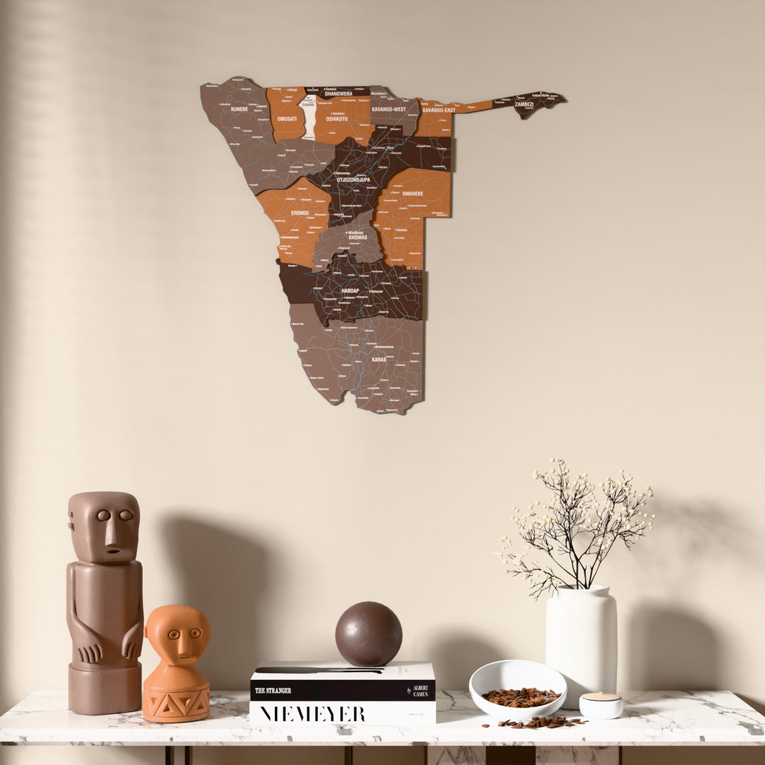 Soil Namibia wooden wall map above a marble console, front view