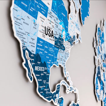 Close-up of North America on the Navy metal world map, showing USA state names and Mexico