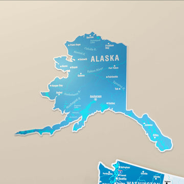 Close-up of the Alaska panel on the navy metal USA map with Anchorage and the Yukon River labeled