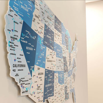 Angled close-up of the western states on the navy metal USA map, including California, Nevada and Arizona