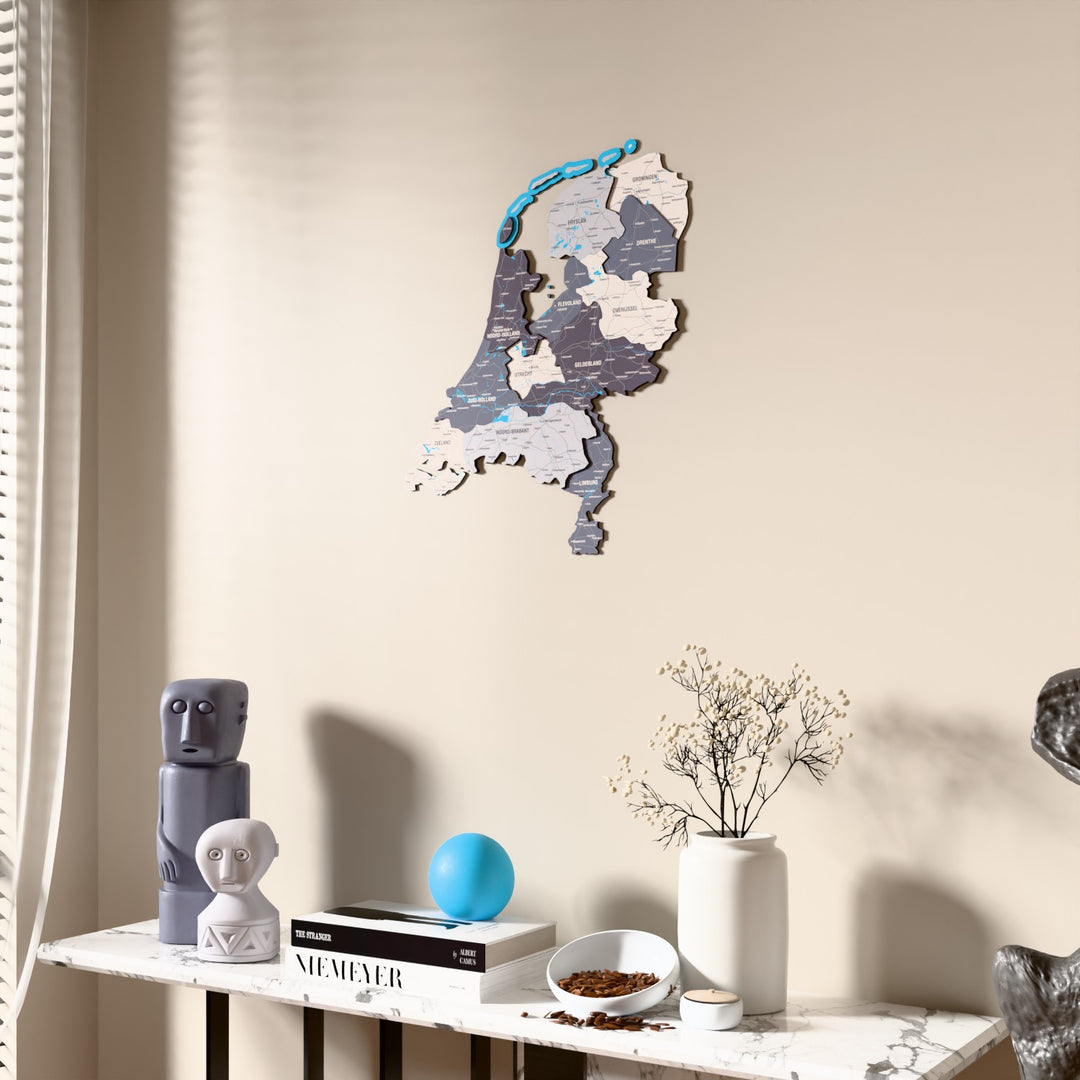 Nimbus Netherlands wooden wall map beside a sheer curtain, angled view