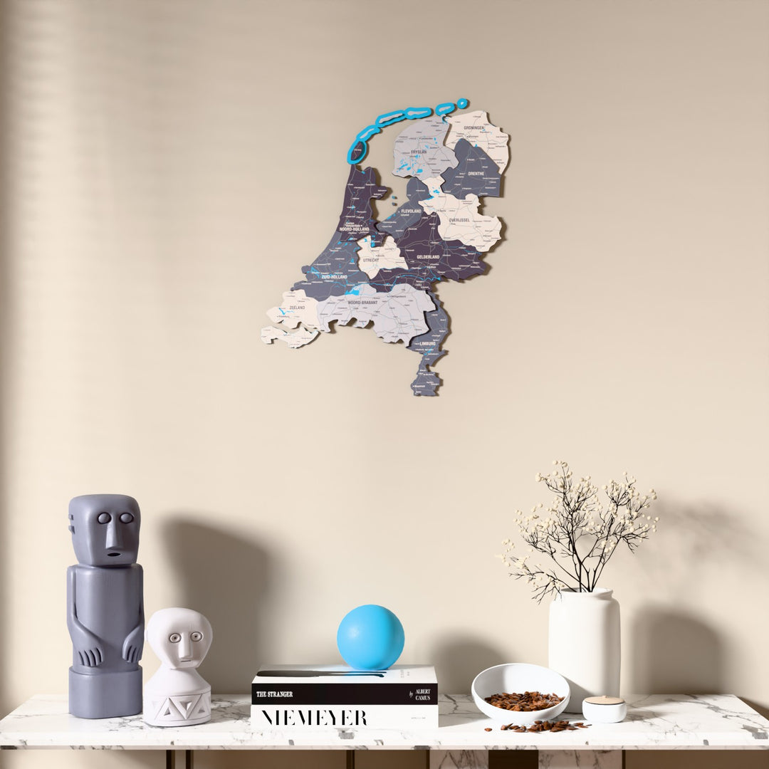 Nimbus Netherlands wooden wall map above a marble console, front view