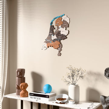 Soil Netherlands wooden wall map beside a sheer curtain, angled view