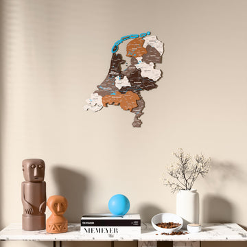 Soil Netherlands wooden wall map above a marble console, front view