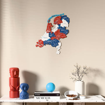 Flag colored Netherlands wooden wall map above a marble console, front view