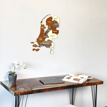 Netherlands wooden wall map closer view above a dark desk