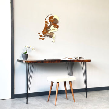 Netherlands wooden wall map small view above a slim dark desk