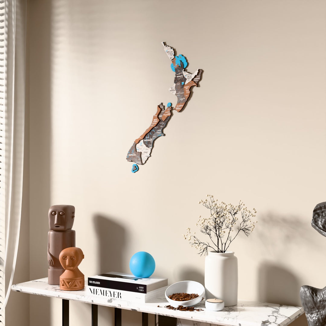 Soil New Zealand wooden wall map beside a sheer curtain, angled view
