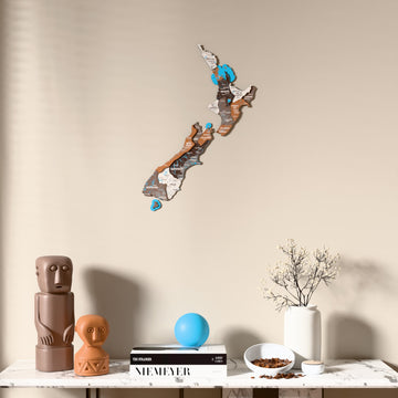 Soil New Zealand wooden wall map above a marble console, front view