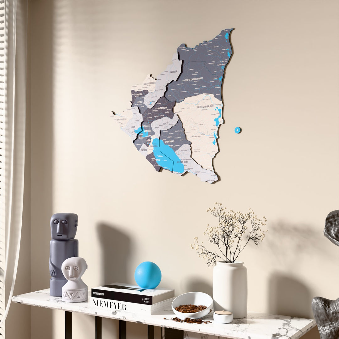 Nimbus Nicaragua wooden wall map beside a sheer curtain, angled view