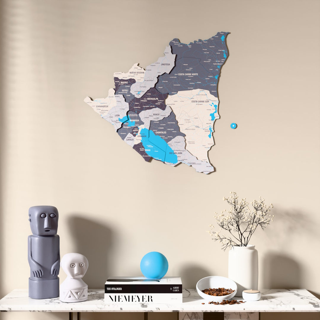 Nimbus Nicaragua wooden wall map above a marble console, front view