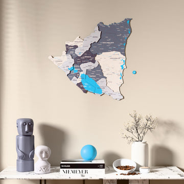 Nimbus Nicaragua wooden wall map above a marble console, front view
