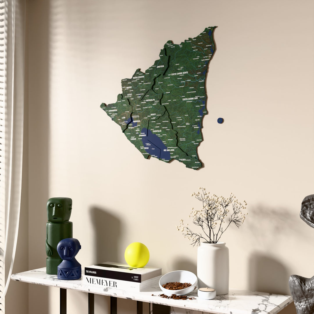 Satellite Nicaragua wooden wall map beside a sheer curtain, angled view