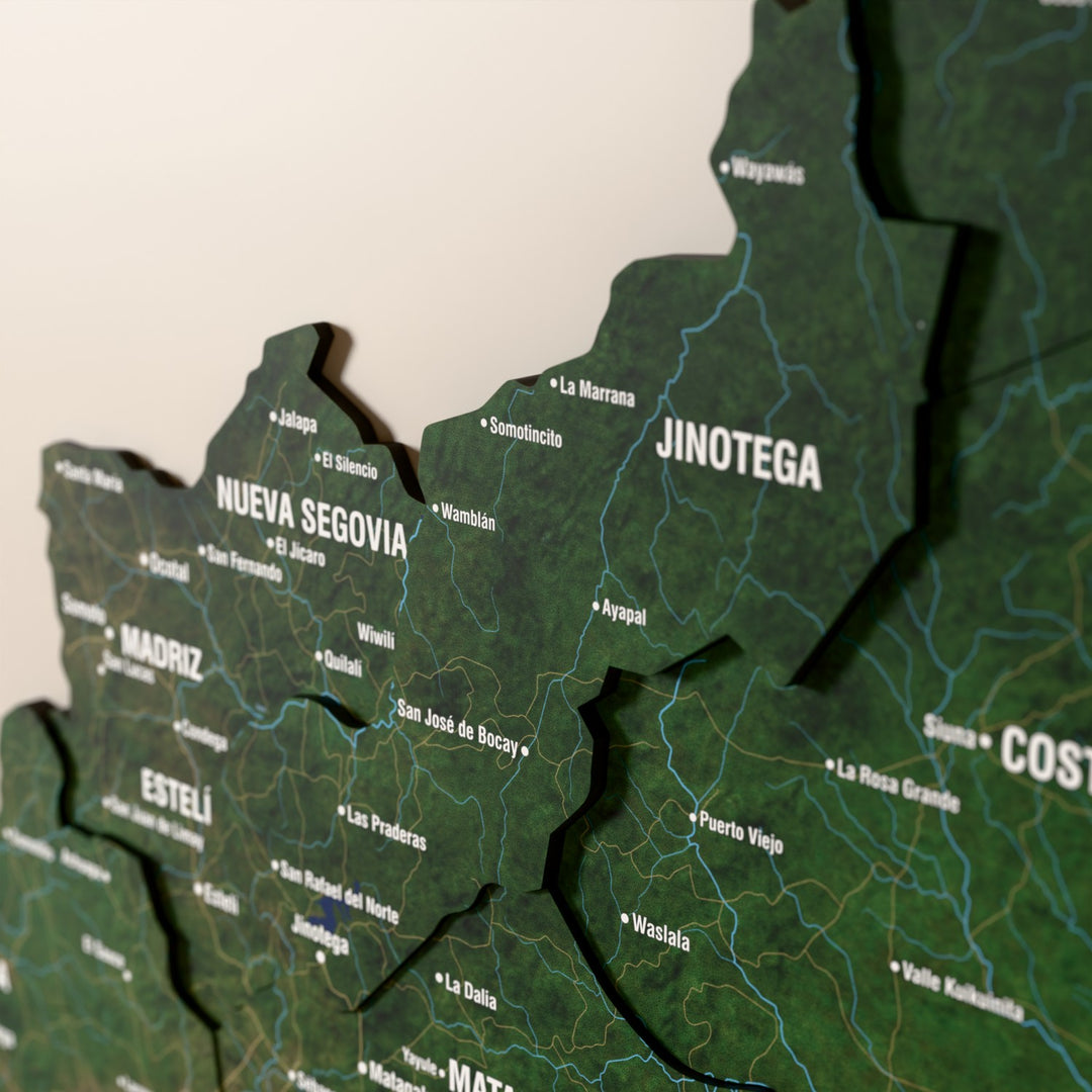 Close-up of the Satellite Nicaragua wooden wall map with layered regions and printed names