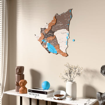 Soil Nicaragua wooden wall map beside a sheer curtain, angled view