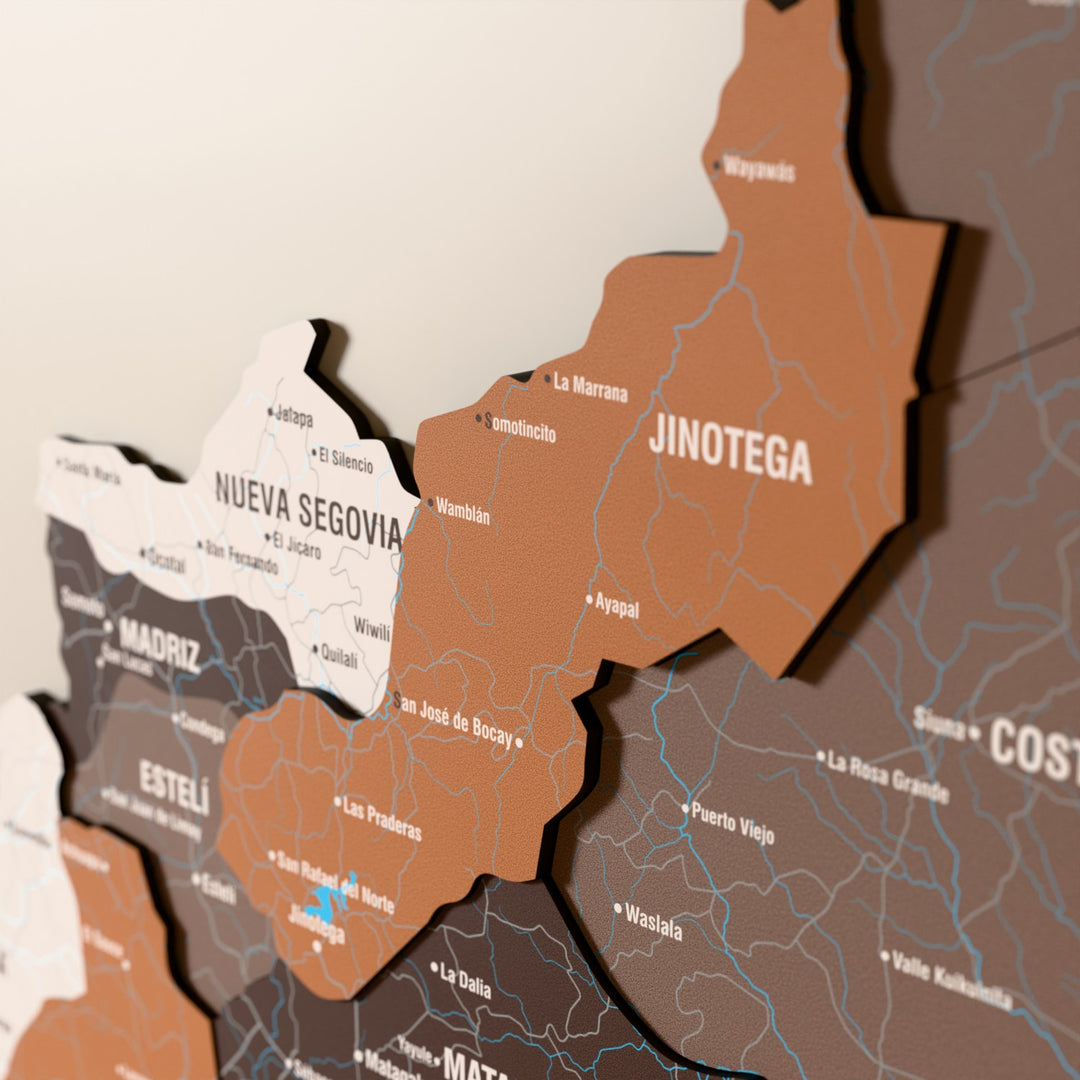Close-up of the Soil Nicaragua wooden wall map with layered regions and printed names