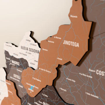 Close-up of the Soil Nicaragua wooden wall map with layered regions and printed names