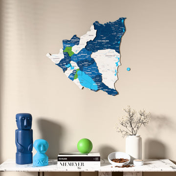 Flag colored Nicaragua wooden wall map above a marble console, front view