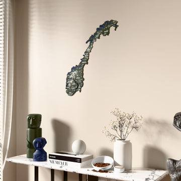 Satellite Norway wooden wall map beside a sheer curtain, angled view
