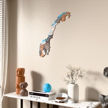 Soil Norway wooden wall map beside a sheer curtain, angled view
