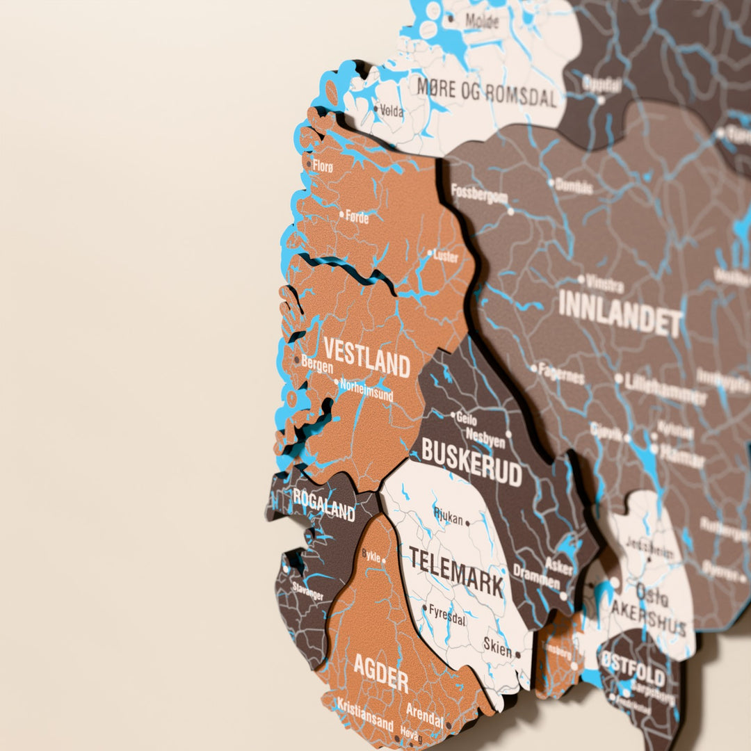 Close-up of the Soil Norway wooden wall map with layered regions and printed names