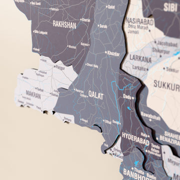 Close-up of the Nimbus Pakistan wooden wall map with layered regions and printed names