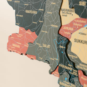Close-up of the Sage Pakistan wooden wall map with layered regions and printed names