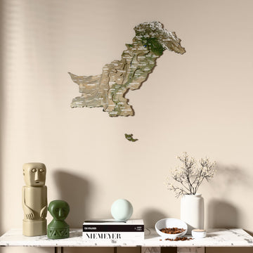 Satellite Pakistan wooden wall map above a marble console, front view