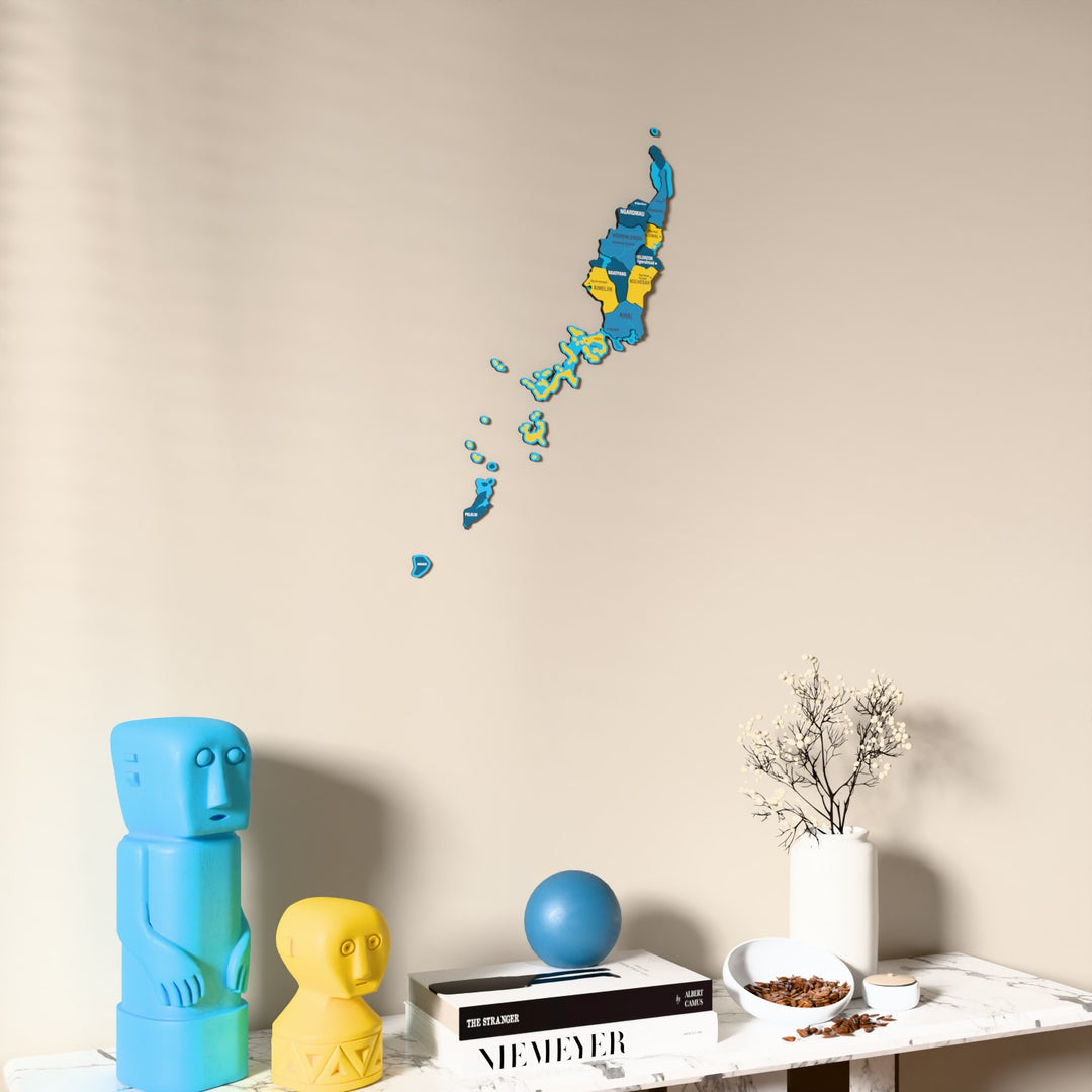Flag colored Palau wooden wall map on a beige wall above a console with figurines