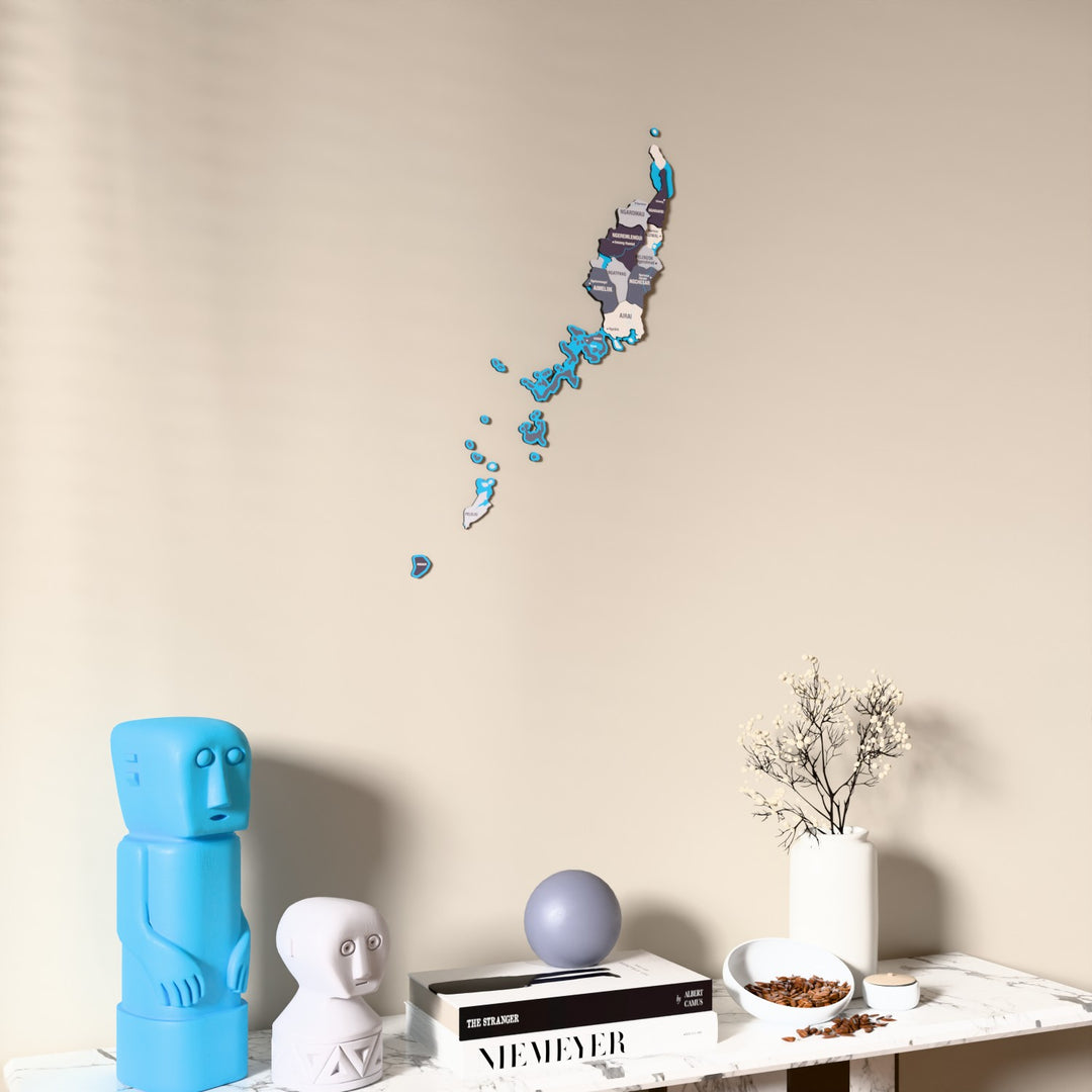 Nimbus Palau wooden wall map on a beige wall above a console with figurines