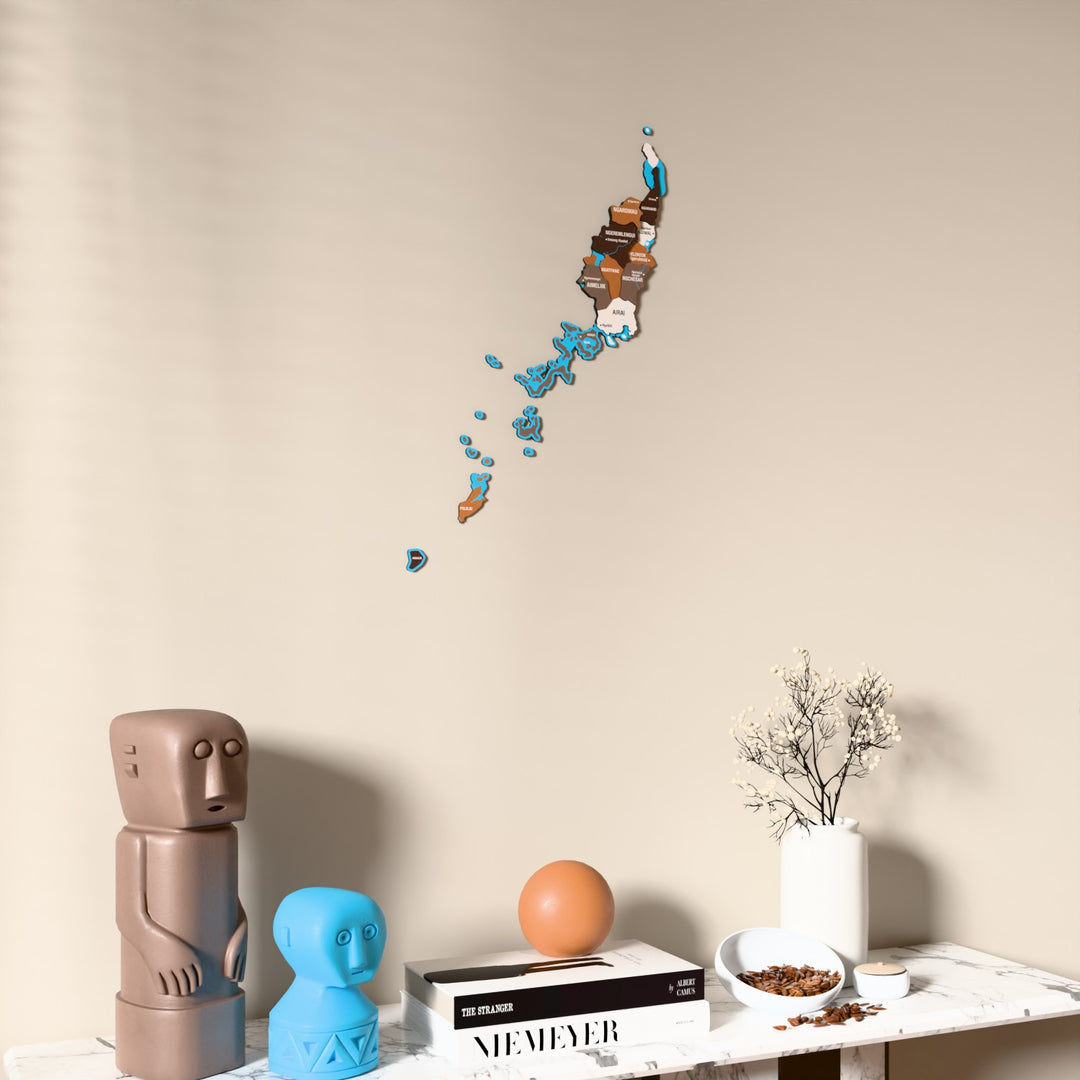 Soil Palau wooden wall map on a beige wall above a console with figurines