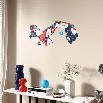 Flag colored Panama wooden wall map beside a sheer curtain, angled view