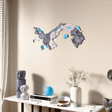 Nimbus Panama wooden wall map beside a sheer curtain, angled view