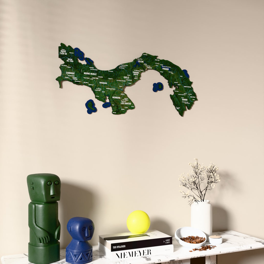 Satellite Panama wooden wall map on a beige wall above a console with figurines