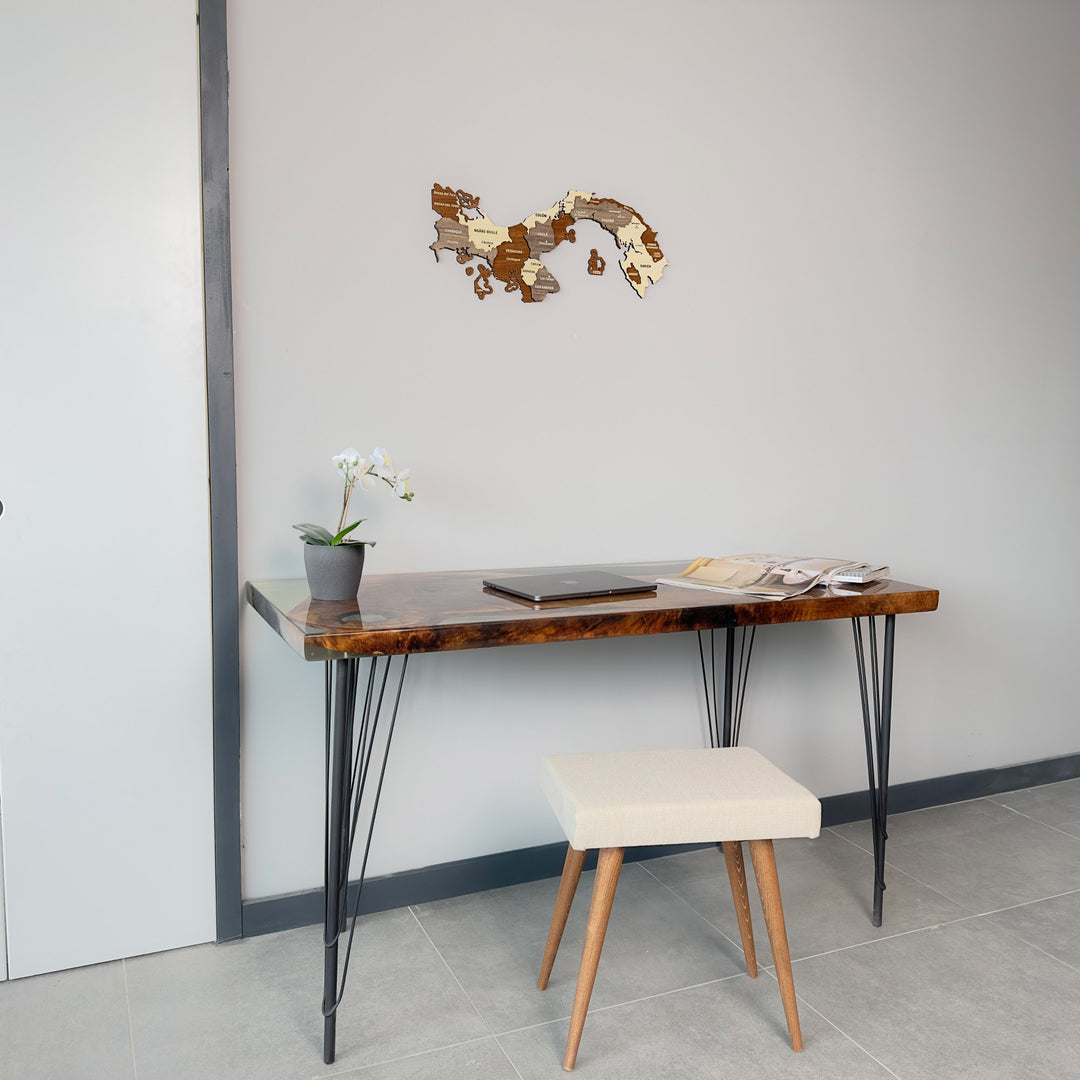 Panama wooden wall map above a desk and stool, wide view of the room corner