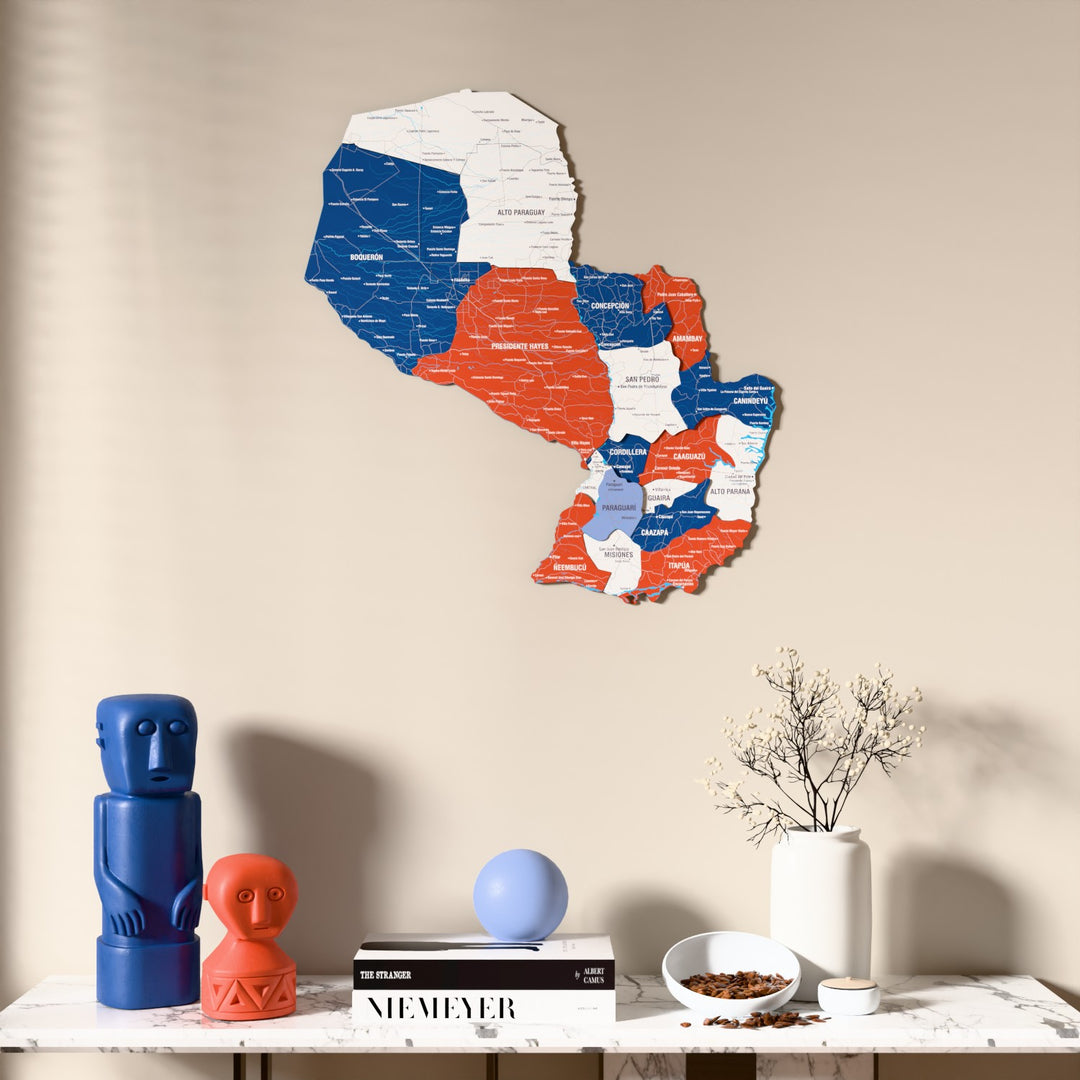 Flag colored Paraguay wooden wall map above a marble console, front view