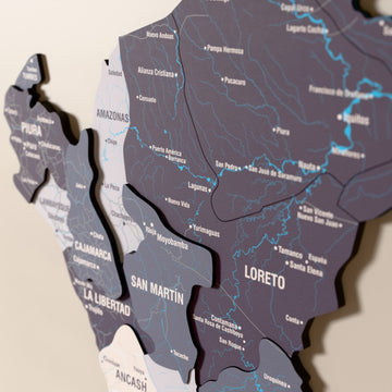 Close-up of the Nimbus Peru wooden wall map with layered regions and printed names