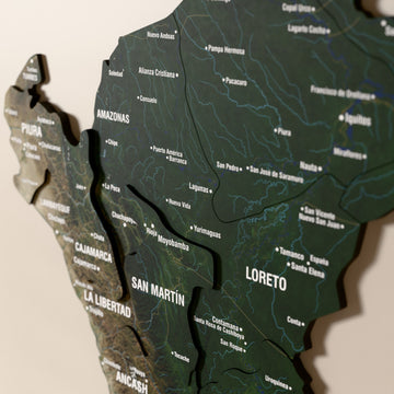 Close-up of the Satellite Peru wooden wall map with layered regions and printed names