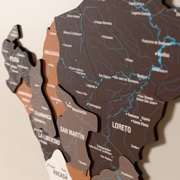 Close-up of the Soil Peru wooden wall map with layered regions and printed names