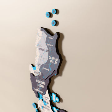 Close-up of the Nimbus Philippines wooden wall map with layered regions and printed names