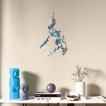 Nimbus Philippines wooden wall map above a marble console, front view