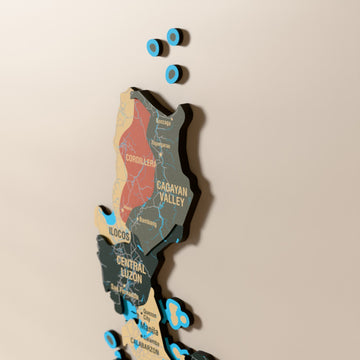 Close-up of the Sage Philippines wooden wall map with layered regions and printed names