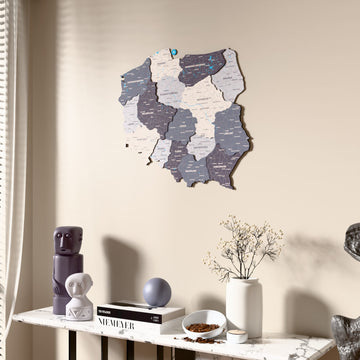 Nimbus Poland wooden wall map beside a sheer curtain, angled view
