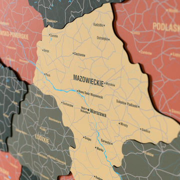 Close-up of the Sage Poland wooden wall map with layered regions and printed names