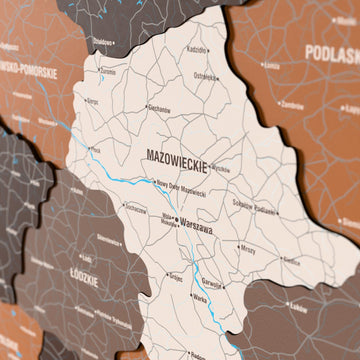 Close-up of the Soil Poland wooden wall map with layered regions and printed names