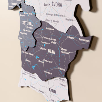Close-up of the Nimbus Portugal wooden wall map with layered regions and printed names
